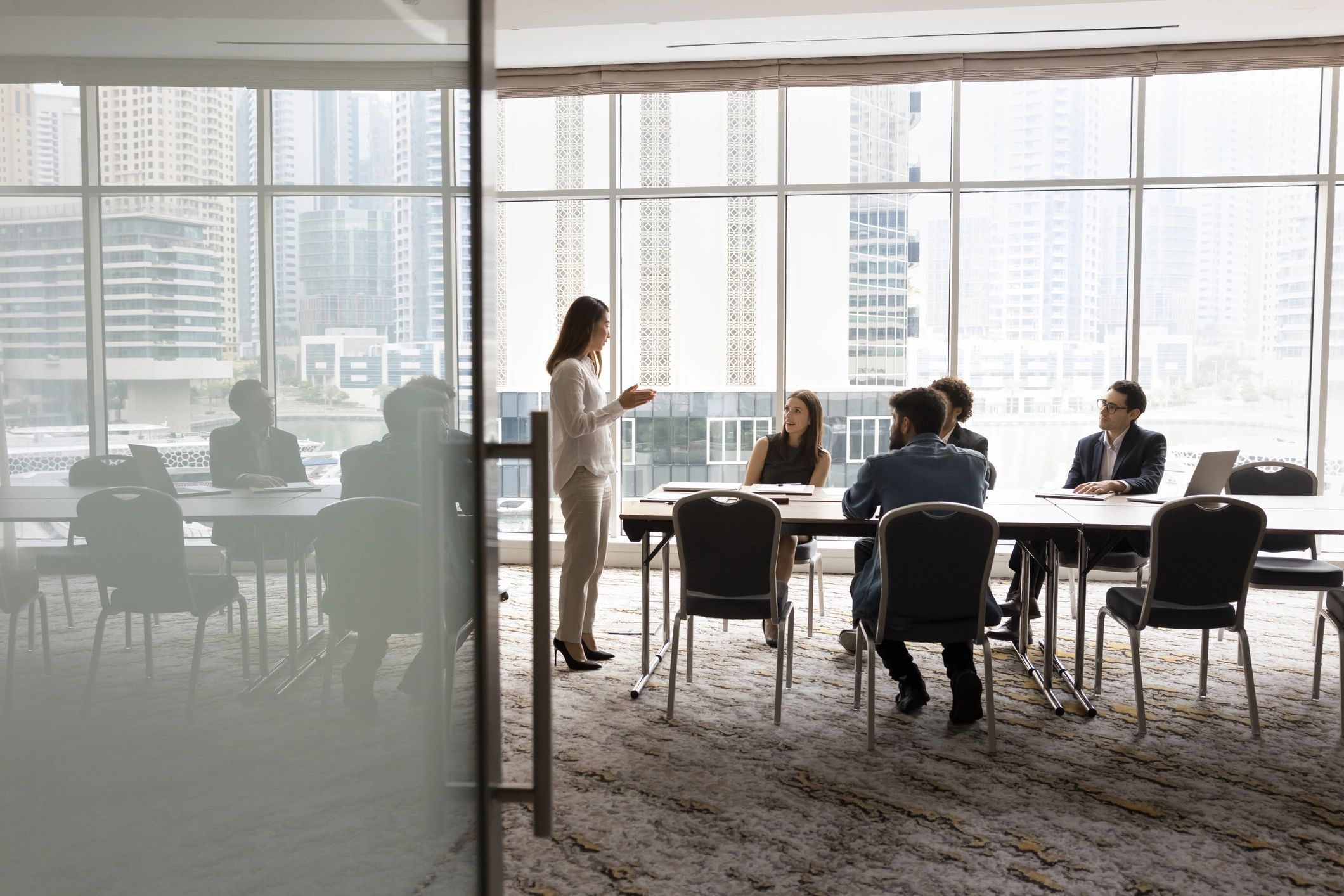 Business team coordinating staffing plans in a meeting room