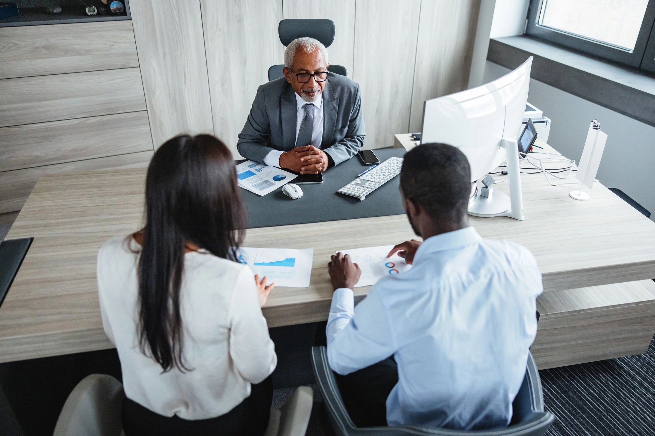 Business professionals in a collaborative office meeting