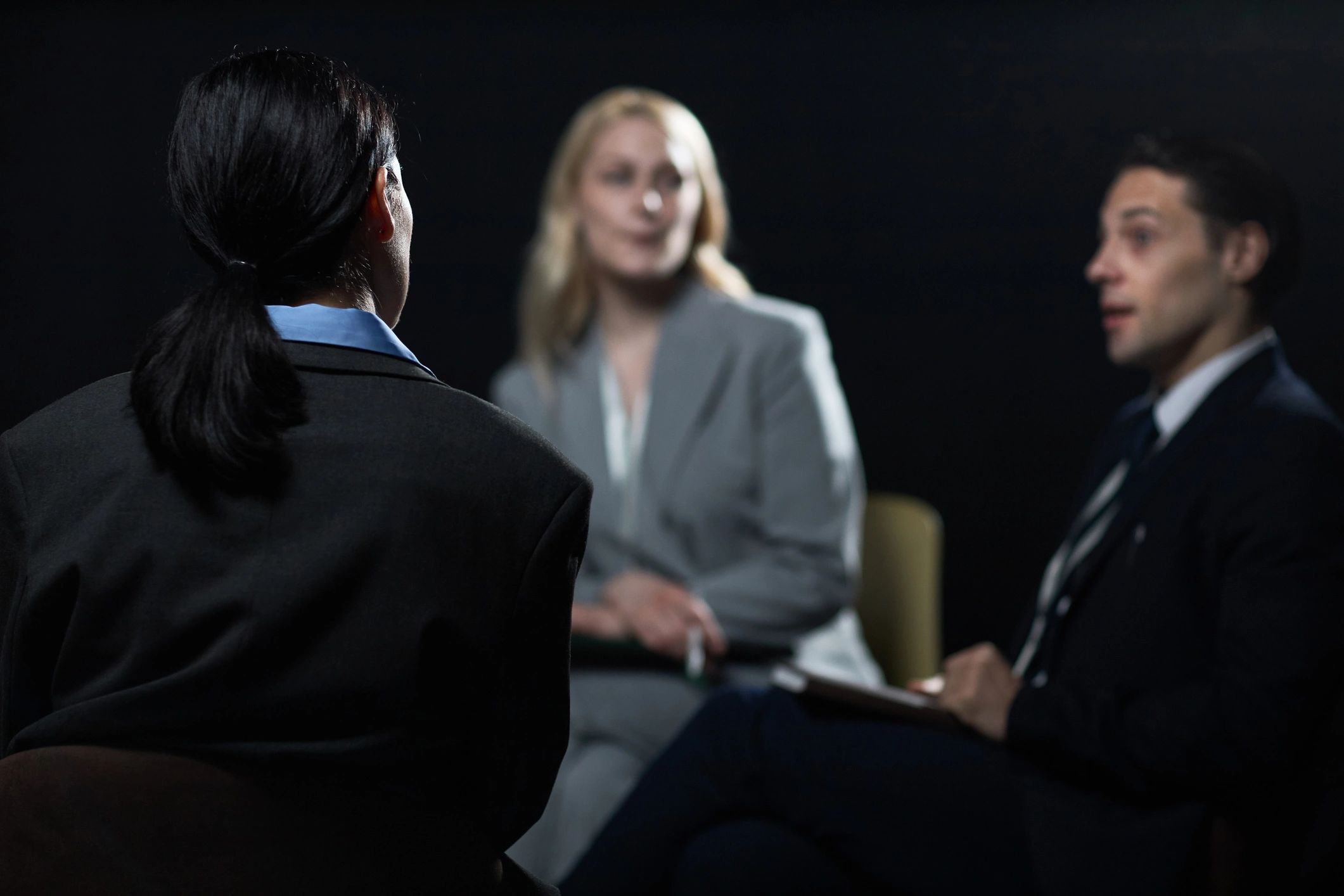 Recruiters interviewing a job candidate in an office